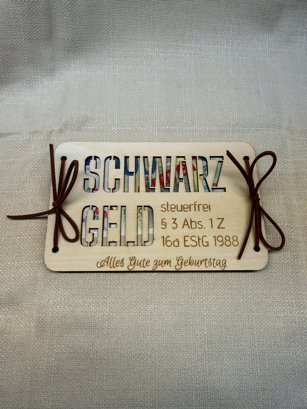 Geldgeschenk aus Holz „Schwarzgeld“